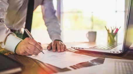 entrepreneur signing documents