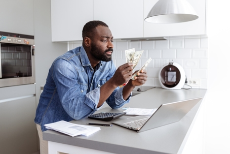 troubled person counting money