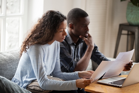 couple looking at paperwork